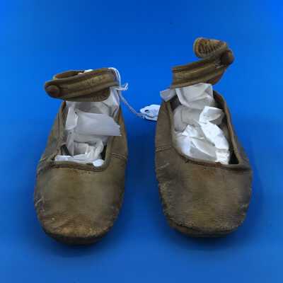 Pair of tan kid baby shoes worn by Charles Paxton Davis, c. 1902