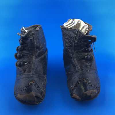 Black leather high button shoes with leather toes and five buttons, late 1890s