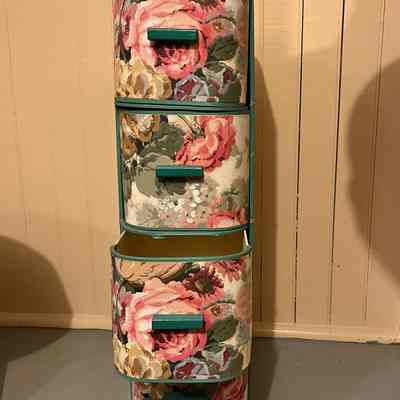 Stacked shoe storage box with four drawers and floral paper cover, c. 1940