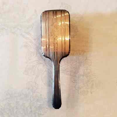 Silver mirror and brush of Edith Meyers, c. 1920s