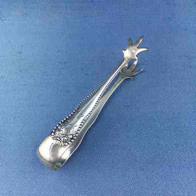 Silver sugar tongs of the Gilroy family, c. 1890s