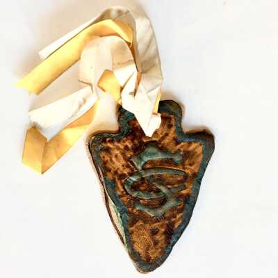 Arrowhead shaped invitation for Leroy Burckhalter to a birthday party, 1909