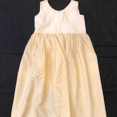 Cream wool petticoat with white cotton bodice, labeled 'Bruce', c. 1900s