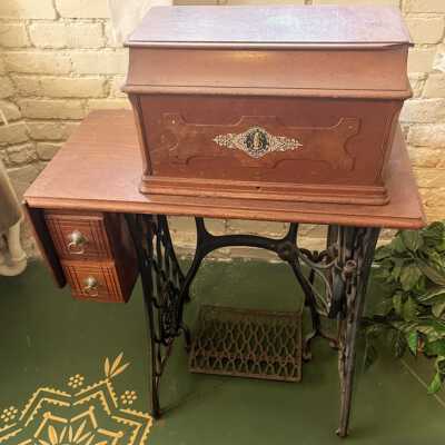 Singer Sewing Machine in cabinet of Mrs. Egga A. Craven, c. 1890