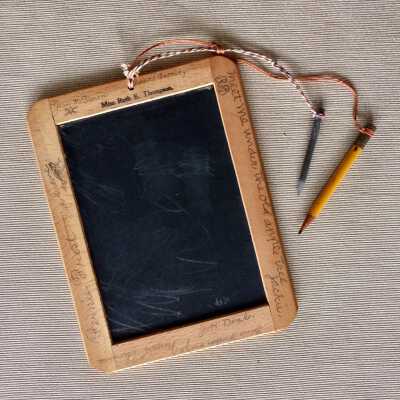Ruth E. Thompson's slate with stylus and pencil, c. 1905
