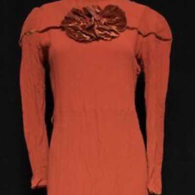 Day dress of rust-colored crepe with silk velvet trim, c. late 1930s