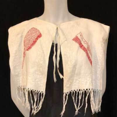 Shoulder duster with embroidered designs of comb, brush, and mirror, early 1900s