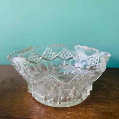 Clear gass bowl with scalloped and inverted rim, c. 1910