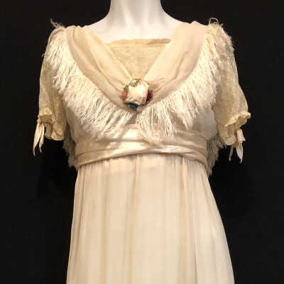 White satin dress with striped over-tunic and perfume sachet, c. 1912