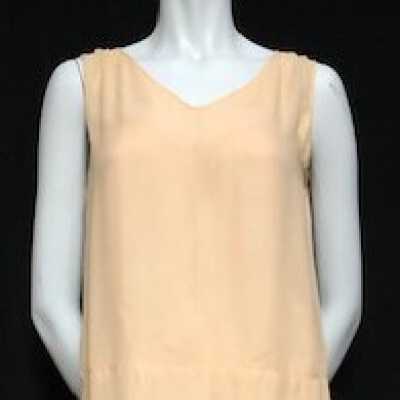 Peach colored crepe dress with peach lace handkerchief hem, 1926