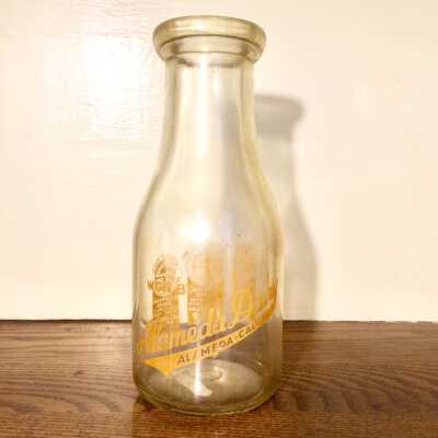Clear glass Milk Bottle from the Alameda Dairy, after 1940