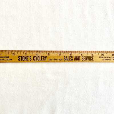 Wooden ruler advertising Stone's Cyclery Sales & Service, prior to 1970