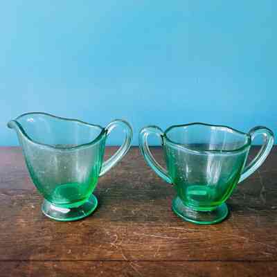 Green Depression glass sugar bowl and creamer, c. 1930s