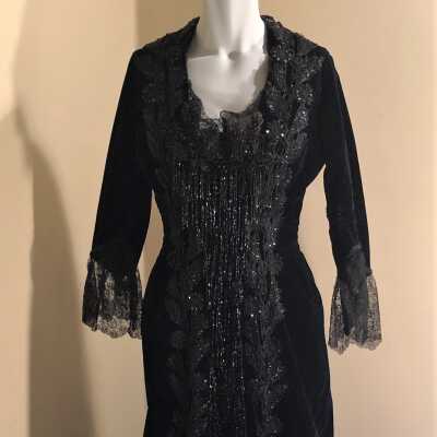 Black silk velvet long-sleeved gown with train, c. 1880s