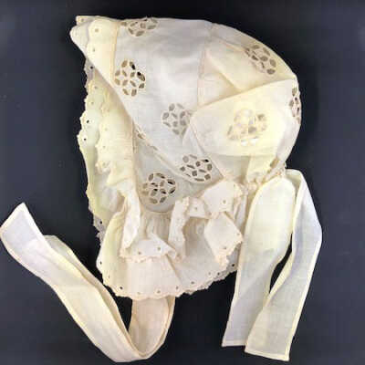 Ecru lawn bonnet with ruffle and embroidery, c. 1900s