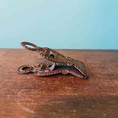 Hanging brass paper clip, late 19th century