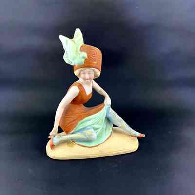 Figurine of a girl showing legs of the Anderson family, c. 1912-1915