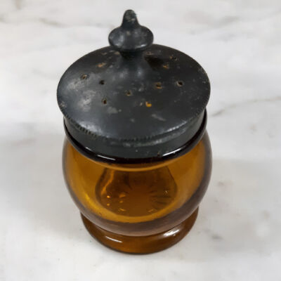 Amber glass shaker with pewter screw top, 19th century