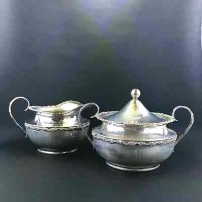 Shreve & Co sterling silver creamer & covered sugar bowl of the Macdonald family