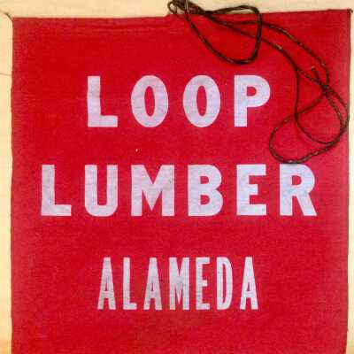 Red canvas Loop Lumber flag, c. 1970s