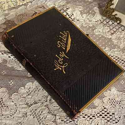 Holy Bible with imitation leather cover with gold lettering and brass trim, c. 1889