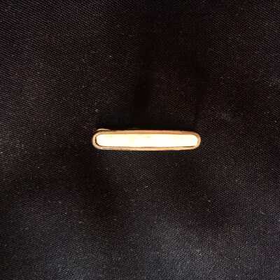 Tie clip of the Martin family, c. 1930s