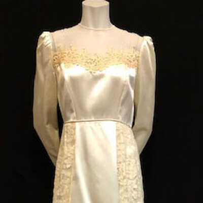 Off-white one-piece satin wedding gown of the King family, 1948