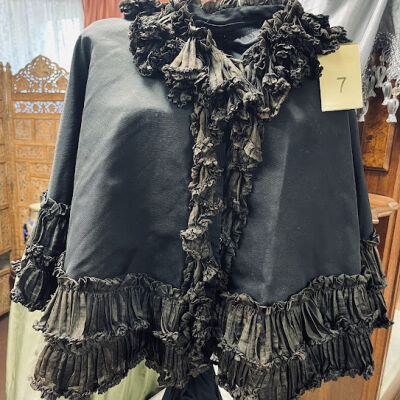 Black silk faille demi cape of Sophia May, c. 1900