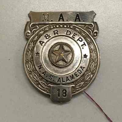 NAS badge, M.A.A.A. & R. Department, prior 1997