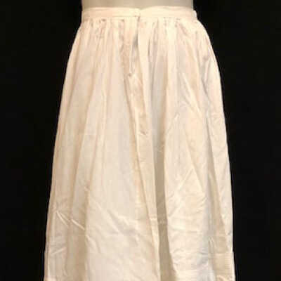 White cotton petticoat with over flounce of lace and tucks, early 1900s