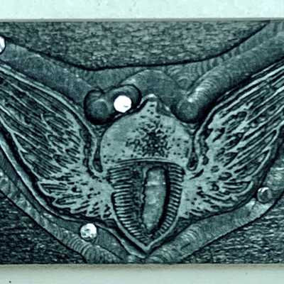 Wooden printing block of a winged helmet of Otto Rittler, 1920-1930