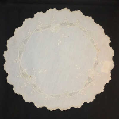 Circular white linen doily with embroidered roses, c. 1912-1920