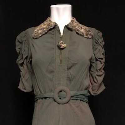 Green crepe one-piec dress with imitation lamb's wool trim, c. 1940s