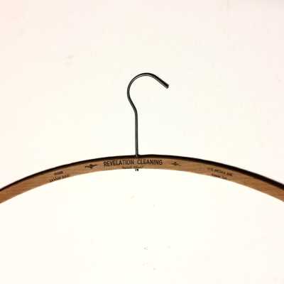 Wooden advertising hanger for Revelation Cleaning, c. 1940s