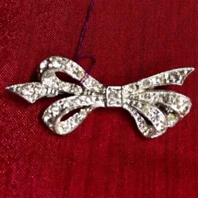 Silver plated Bow shaped brooch with rhinestones, 1930/1940s