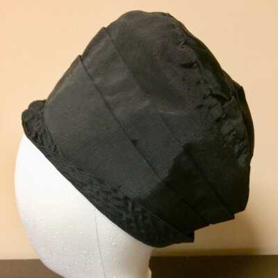 Black Cloche hat with satin and faille on crown, 1920s