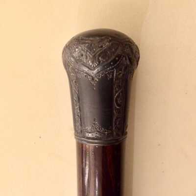 Rosewood walking cane with engraved silver top, c. 1900