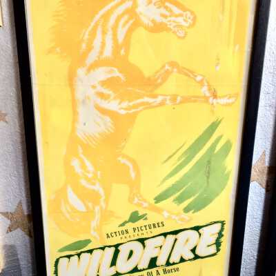Framed movie advertising poster for 'Wildfire', 1943
