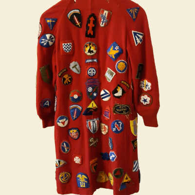 Red Wool Red Cross entertainer's coat with WWII military patches, 1944