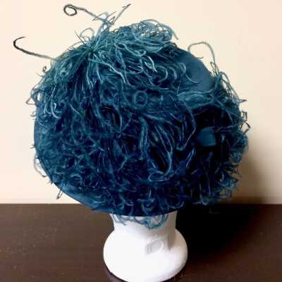 Peacock blue felt hat with ostrich feathers and hat pins, 1942