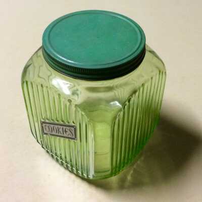 Green glass opaque cookie jar with green metal screw top, c. 1930