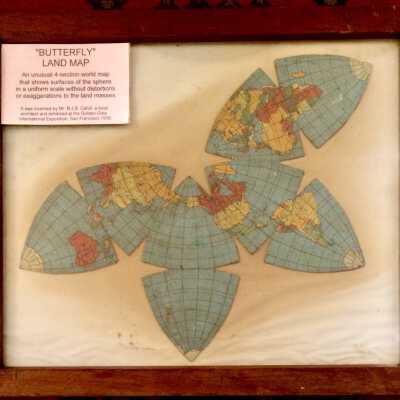 Framed butterfly world map invented by B.J.S. Cahill, c. 1930