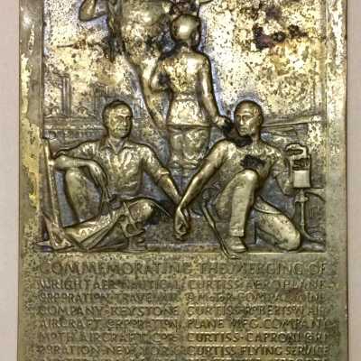 Cast brass miniature plaque paper weight of Raymond P. Bowman, 1929