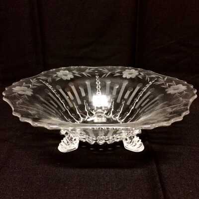 Clear pressed-glass bowl on three feet with floral and icicle patterns, c. 1930s