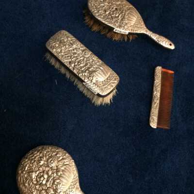 Miniature Dresser set of nickel plated iron, with flowers, 1908