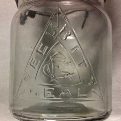 Clear glass jar with metal bail handle from the Martin home, c. 1920s