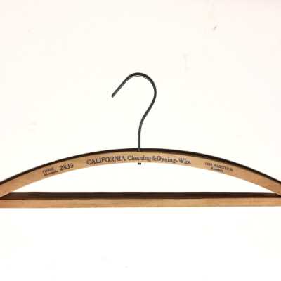Advertising clothing hanger from the California Cleaning and Dyeing Works, prior to 1940