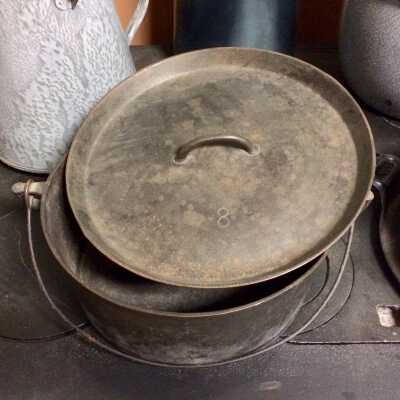 Cast iron pot used by the Meyers to deep fry donuts, before 1920