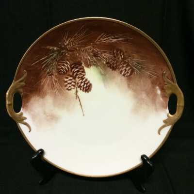 Plate with pine cones by Jorgensen, c. 1920s