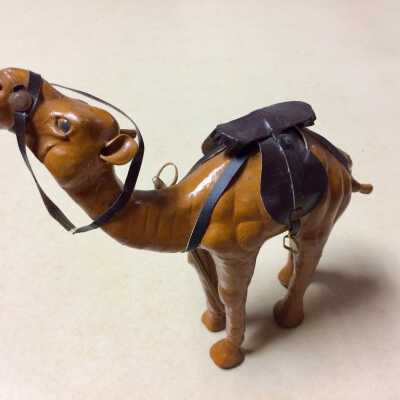 A toy camel with saddle and and reins of Frank H. Perkins, c. 1930s